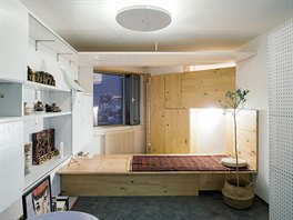 Byt s výhledem na Peking stojí ve čtvrti, která ještě před třiceti lety byla...