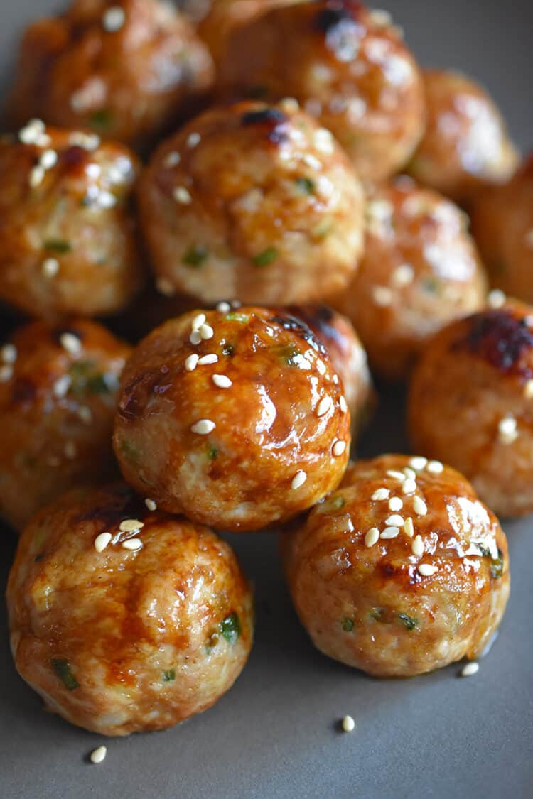 A platter of Whole30 and Paleo-friendly tsukune, Japanese ground chicken meatballs.