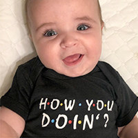 Happy and cute infant in a Friends TV Series onesie from Cafepress