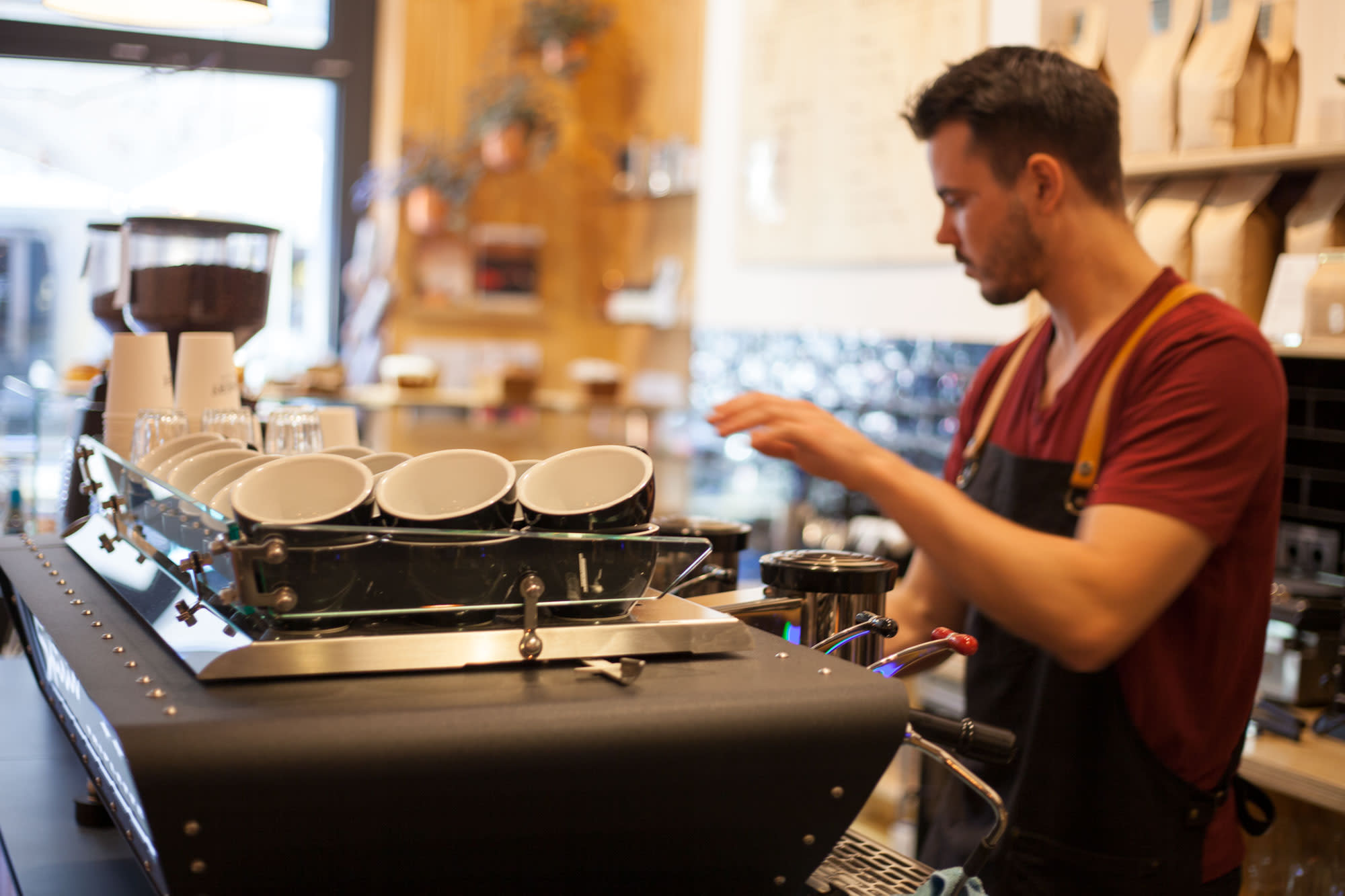 refinery-staff-with-coffee-cups