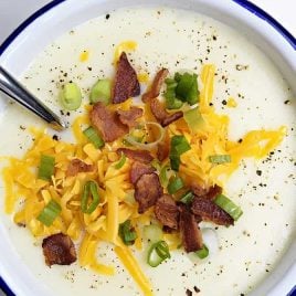 Loaded Baked Potato Soup Recipe - Loaded baked potato soup makes a warm, comforting potato soup recipe. Made with baked potatoes blended into a creamy soup and topped with your potato bar favorites!&nbsp;// addapinch.com