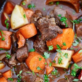 Slow Cooker Beef Bourguignon Recipe -&nbsp;A classic&nbsp;beef bourguignon&nbsp;recipe made easy in the slow cooker! Loaded with vegetables, beef, and a thick, rich sauce perfect for entertaining or busy weeknights! // addapinch.com