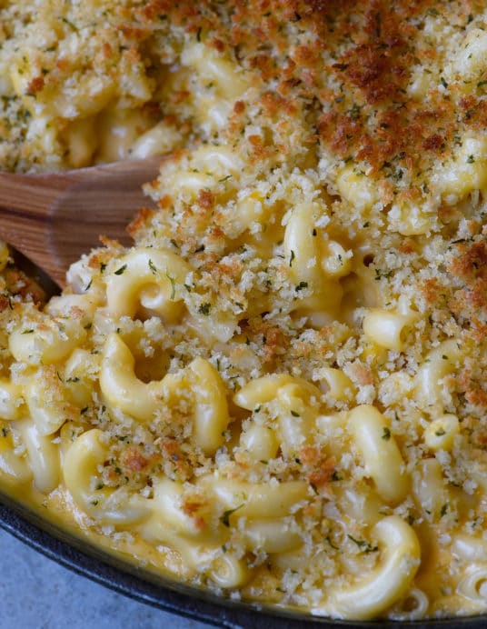 Skillet Mac and Cheese Recipe - Mac and Cheese is the ultimate comfort food! This easy cheesy sauce combined with macaroni and a buttery, crunch topping makes for the creamiest Mac and Cheese! // addapinch.com