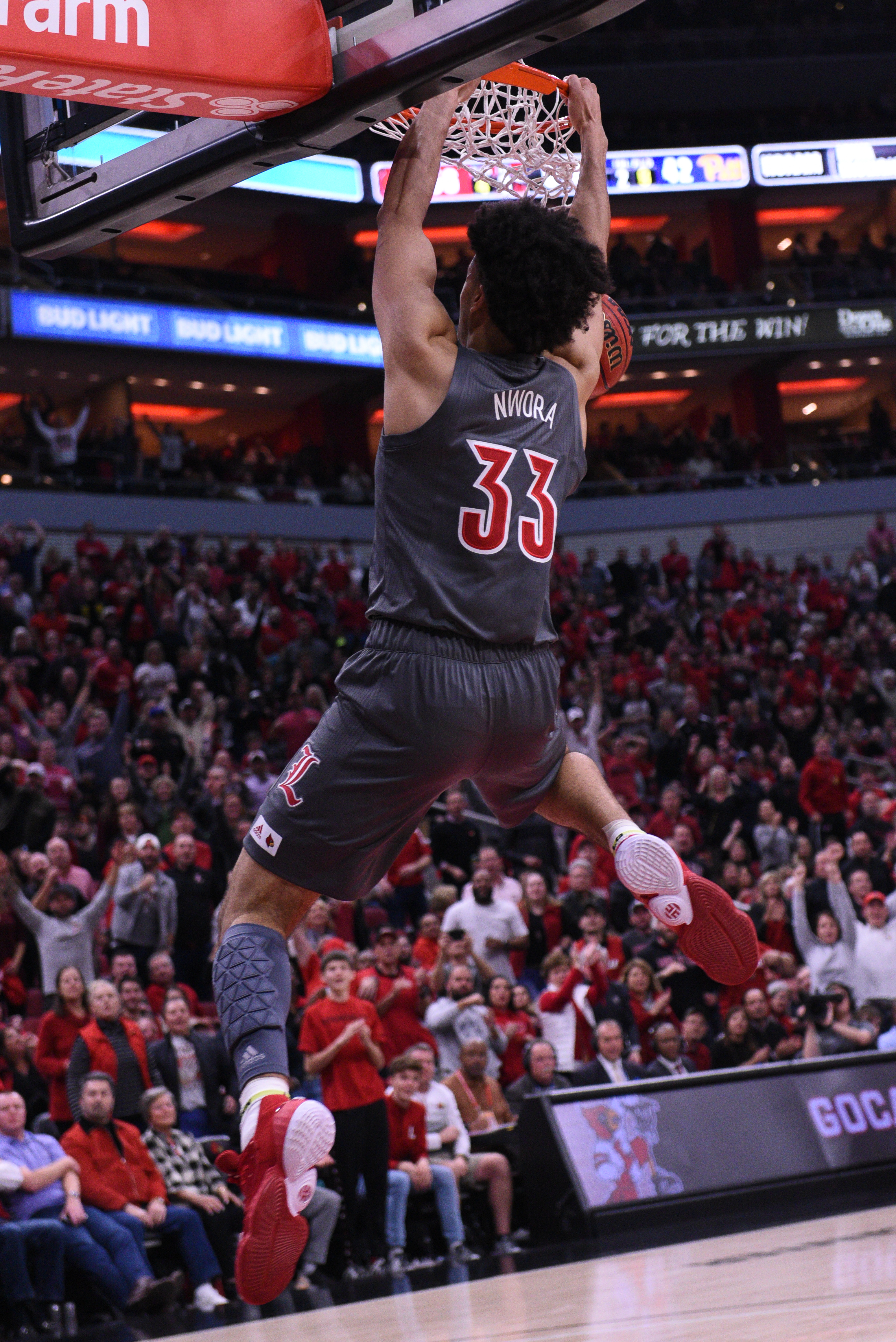 Jordan Nworra dunks in  the win over Pittsburgh.