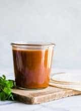 Jar of homemade enchilada sauce recipe.