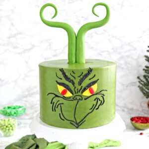 Grinch Cake | From SugarHero.com