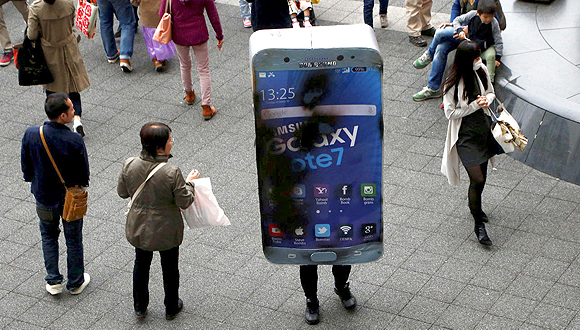A man dressed as a combusted Samsung Galaxy Note 7. Photo: Reuters