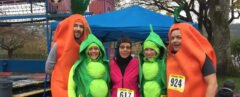 runners wearing carrot and pea costumes