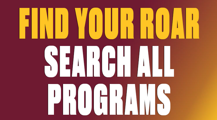 two students working on computers