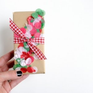 If you tend to do things a little last minute like me, here's an idea for embellishing Christmas gift wrap. This DIY is so fun and colorful!