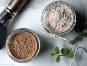 Jars of DIY dry shampoo for light and dark hair