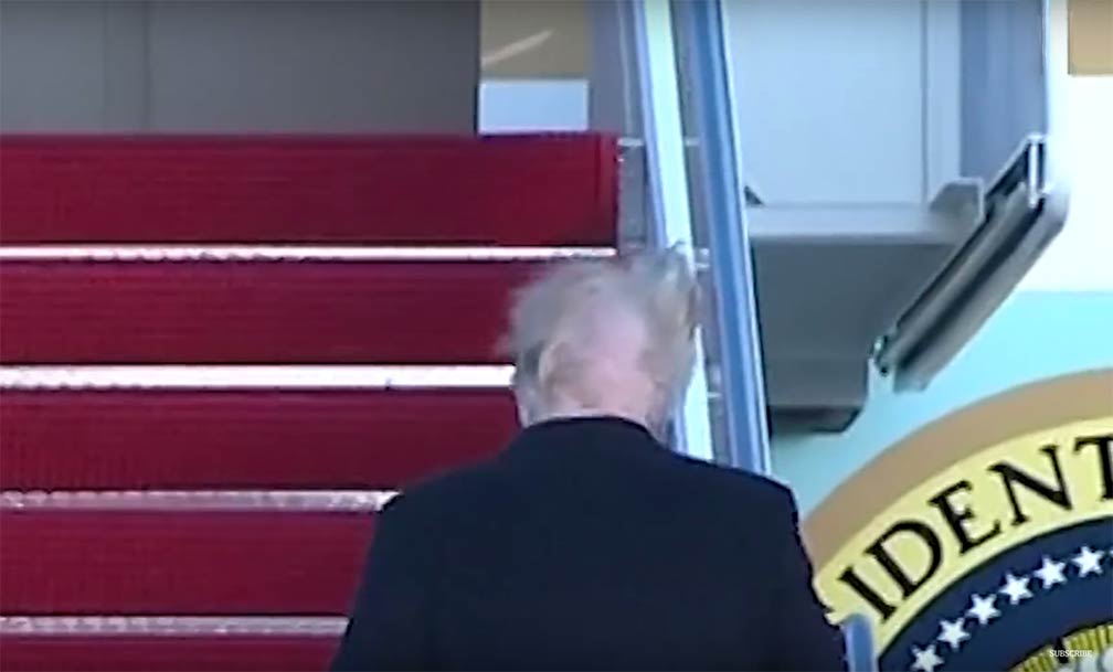 The US President with wind blown hairdo
