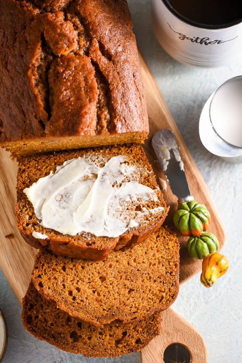 Easy Pumpkin Bread sliced with butter