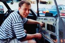 Elon Musk's mother shares a 1995 photo of him fixing car window