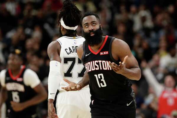 Houston Rockets guard James Harden (13) reacts after a score against the San Antonio Spurs during the second half of an NBA basketball game, in San Antonio, Tuesday, Dec. 3, 2019. San Antonio won 135-133 in double overtime. (AP Photo/Eric Gay)