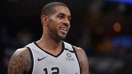 San Antonio Spurs center LaMarcus Aldridge (12) stands on the court in the second half of an NBA basketball game against the Memphis Grizzlies Friday, Jan. 10, 2020, in Memphis, Tenn. (AP Photo/Brandon Dill)
