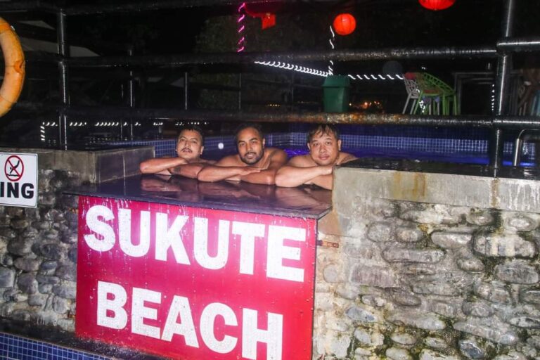 sukute beach swimming pool boys