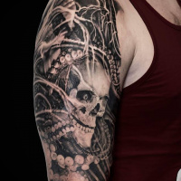 Awesome skull and tentacles tattoo on shoulder