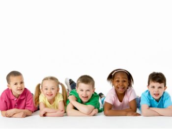 kids lying on the floor side by side