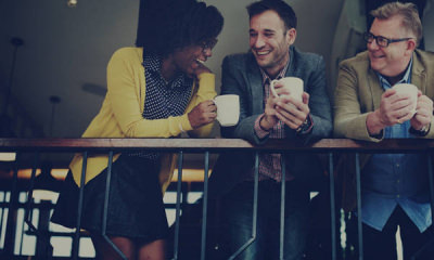 coworkers mugs laughing