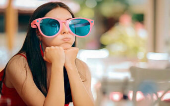 woman with big funny glasses on - illustrating being a more interesting person