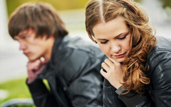 couple looking troubled - illustrating keeping secrets in relationships