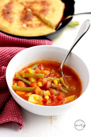 Tomato vegetable soup is a simple, comforting and tasty way to eat more veggies. | APinchOfHealthy.com