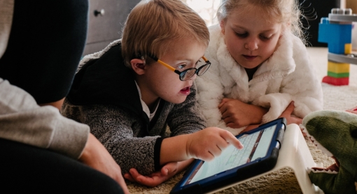 Young boy cannot talk and use Proloquo2Go on iPad