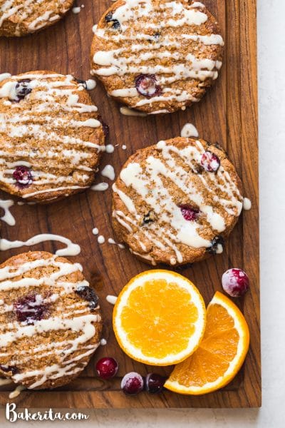 These Gluten-Free Vegan Cranberry Orange Scones&nbsp;will be your new favorite vegan breakfast. This easy scone recipe is made with fresh and dried cranberries, fresh orange juice and zest, and a simple orange glaze for maximum flavor.