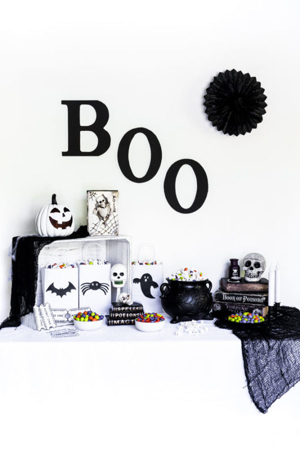 DIY Halloween Popcorn Bags as part of a Halloween party tablescape.