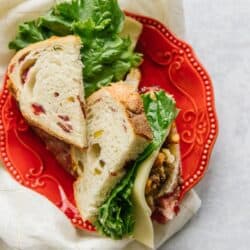 Pilgrim Sandwich cut in half with Cranberry Pistachio Hearth Bread