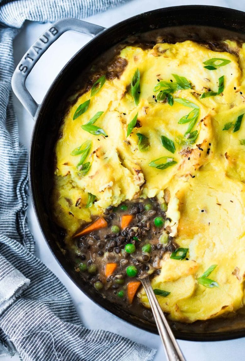 Indian-Spiced, Vegetarian Shepherd's Pie with lentils, veggies and fragrant Garam Masala, topped with curry mashed potatoes. Truly one of the most delicious vegetarian recipes on the blog! #sheperdspie #vegetarianshepherdspie #indianrecipes #garammasala #lentils #vegetariandinner