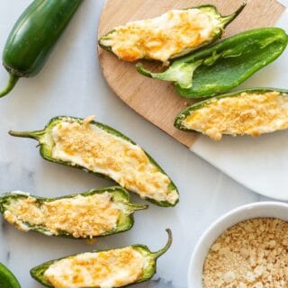 jalapeno poppers on a cutting board