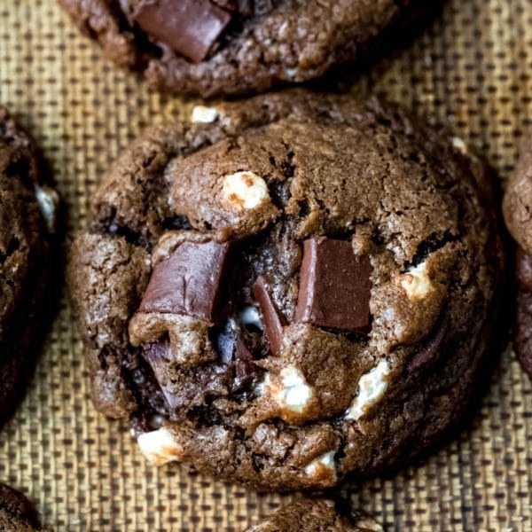 Close up of hot chocolate cookies on a silicone baking mat