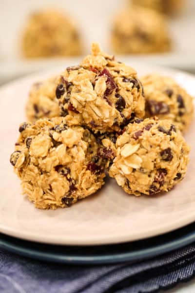 Beef jerky protein balls on a white plate with blue napkin