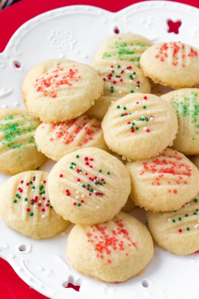Whipped shortbread cookies are light as air with a delicious buttery flavor. They melt in your mouth because they're so soft, and only require a few simple ingredients.