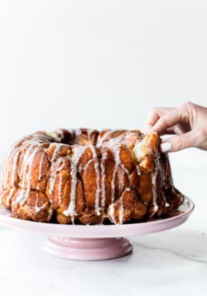 homemade monkey bread on a pink cake stand