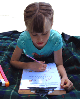 Child working on number rainbows worksheet