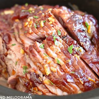 crock pot ham with cranberry orange sauce in slow cooker