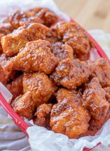 Cajun Buffalo Chicken Bites in a red serving basket