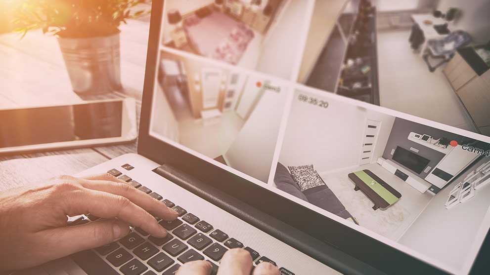 Monitoring cameras at home on a laptop