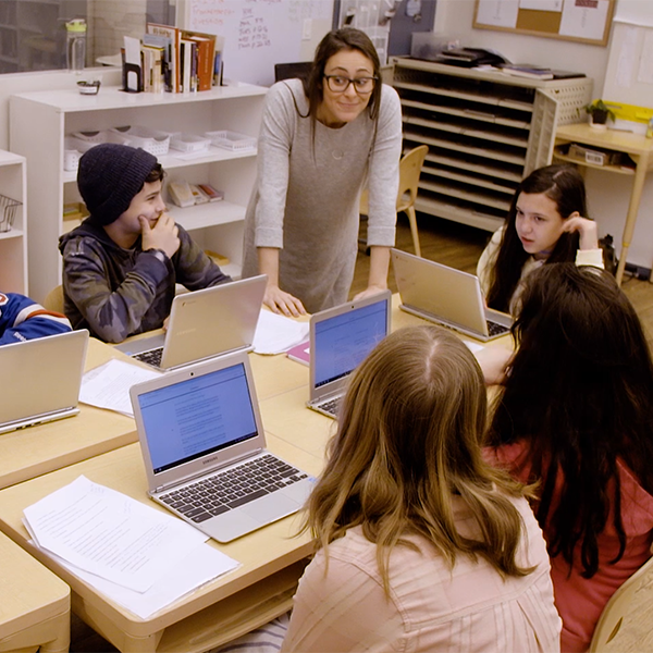 Image of an educator with students