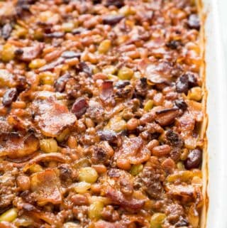 calico beans baked beans in white baking dish