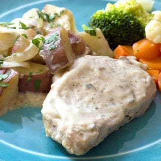 Creamy Crock Pot Pork Chops Potatoes & Onions