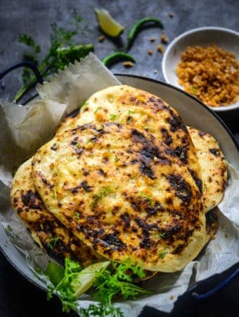 Garlic Naan served on a plate.
