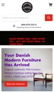 How bydesignmodern.com looks like on a mobile device such as an iPhone.
