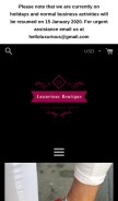 How luxuriousboutique.net looks like on a mobile device such as an iPhone.